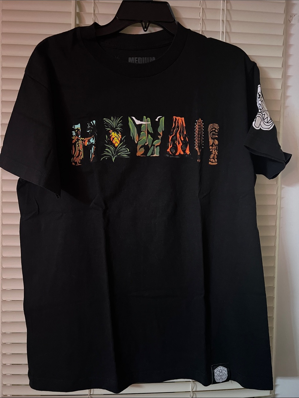 Black Graphic T-Shirt with Tropical Lettering